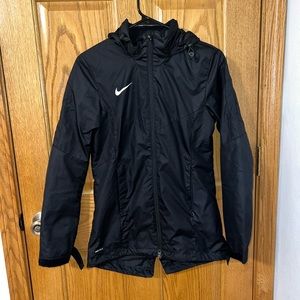 Nike wind breaker / rain jacket size small.